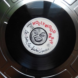 S É R I E “ B O Î T E S D E N U I T” - Série de 12 boîtes de bobines de films (diamètre 18 ou 27,5cm) recouvertes d’un vinyle et de sa lune unique en carte à gratter. “Ce soir, la lune s'amuse...”.